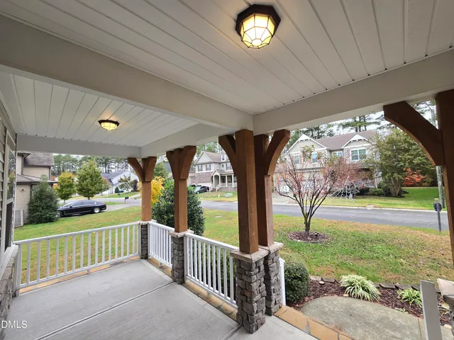 a view of porch with a garden