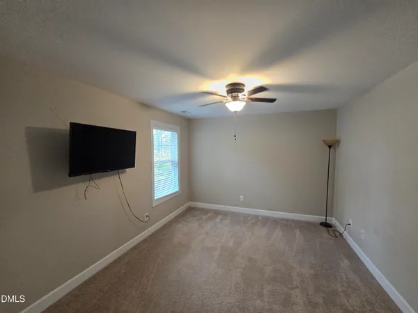 a view of a livingroom with a flat screen tv