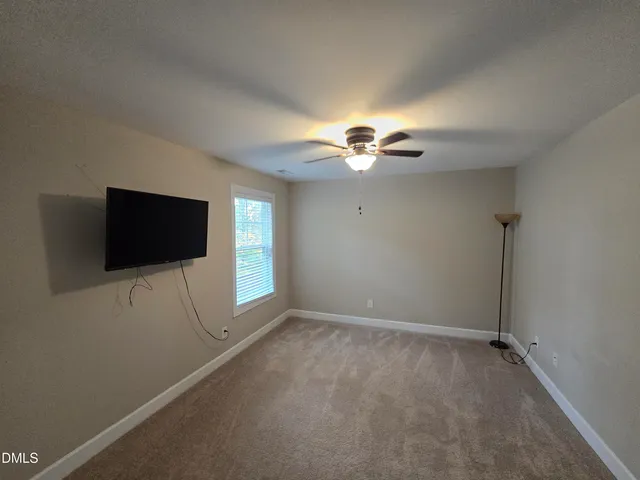 a view of a livingroom with a flat screen tv