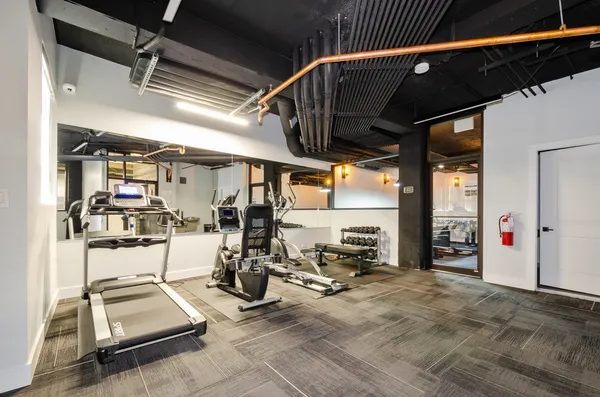 a view of a room with gym equipment