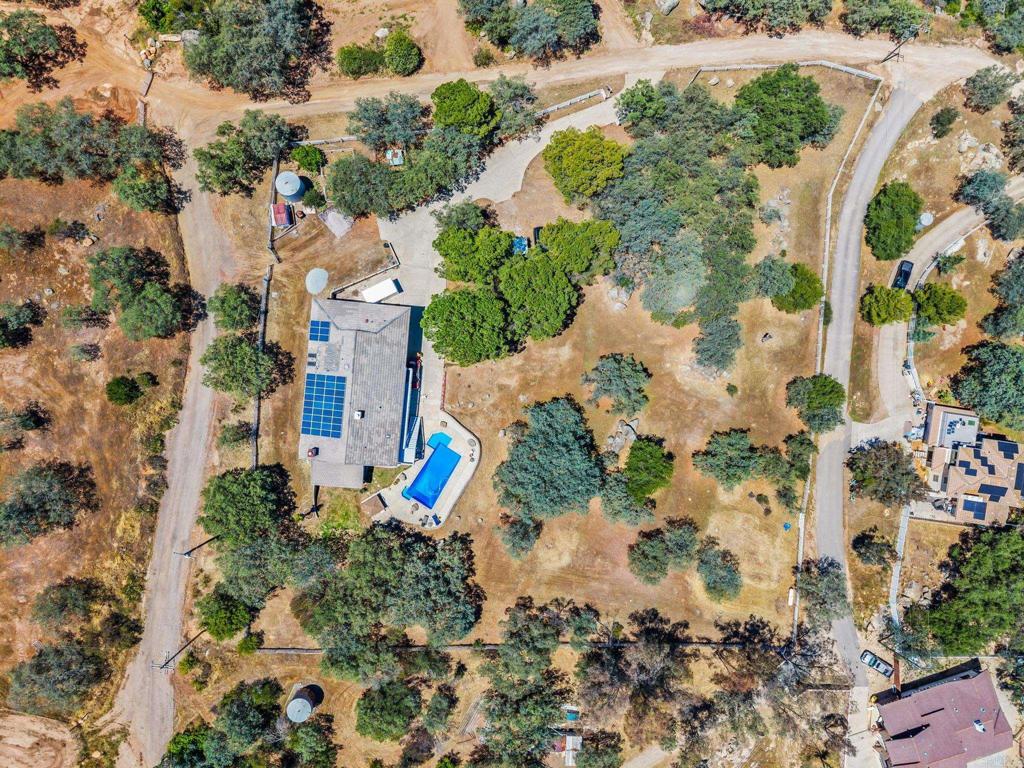 17901 Lyons Valley Road Jamul, CA 91935 - Photo 52 of 52 an aerial view of a house with a yard and a lake view