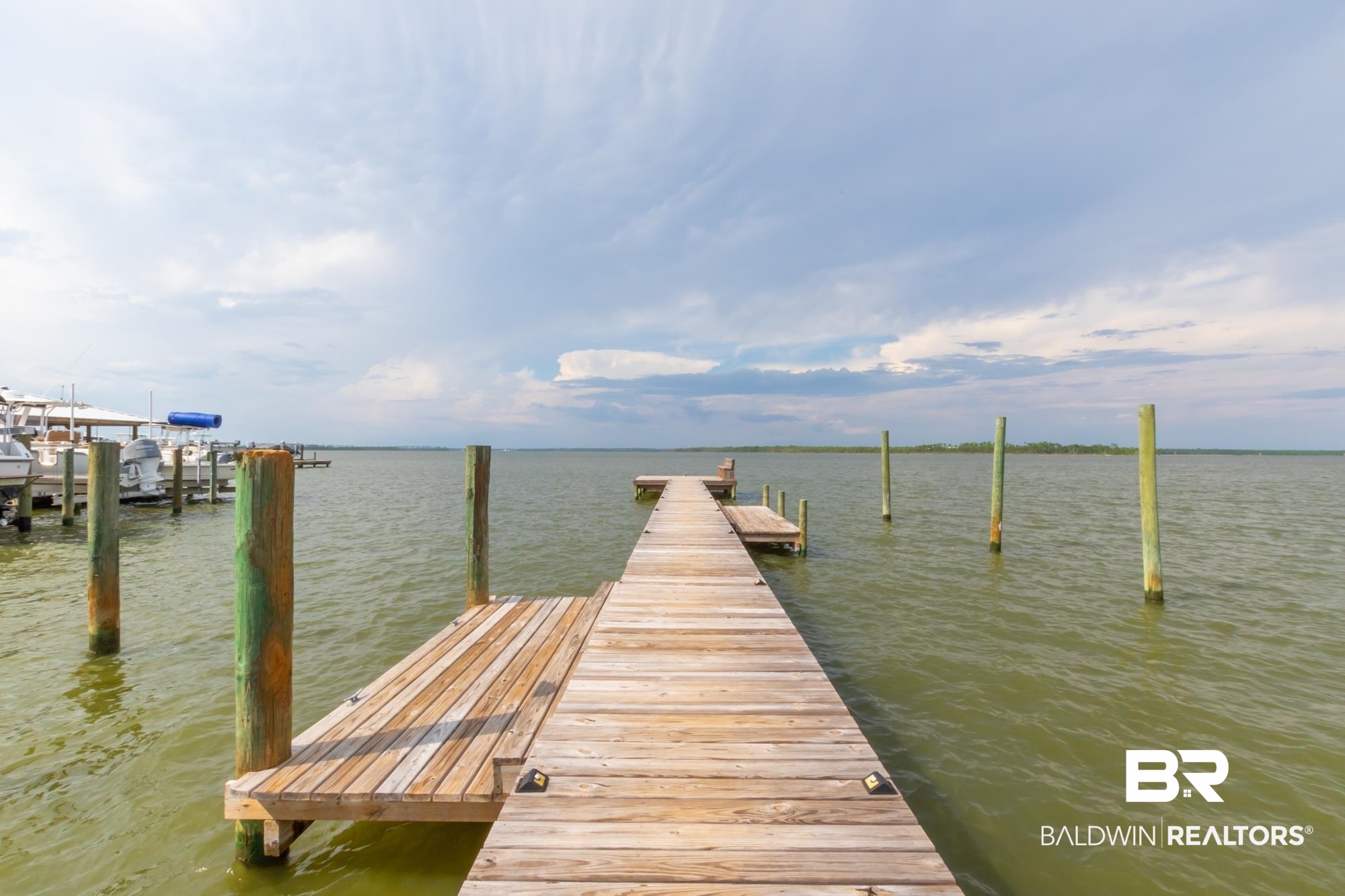 25925 -C Canal Road, Unit 203 Orange Beach, AL 36561 - Photo 53 of 57 Dock area with a water view