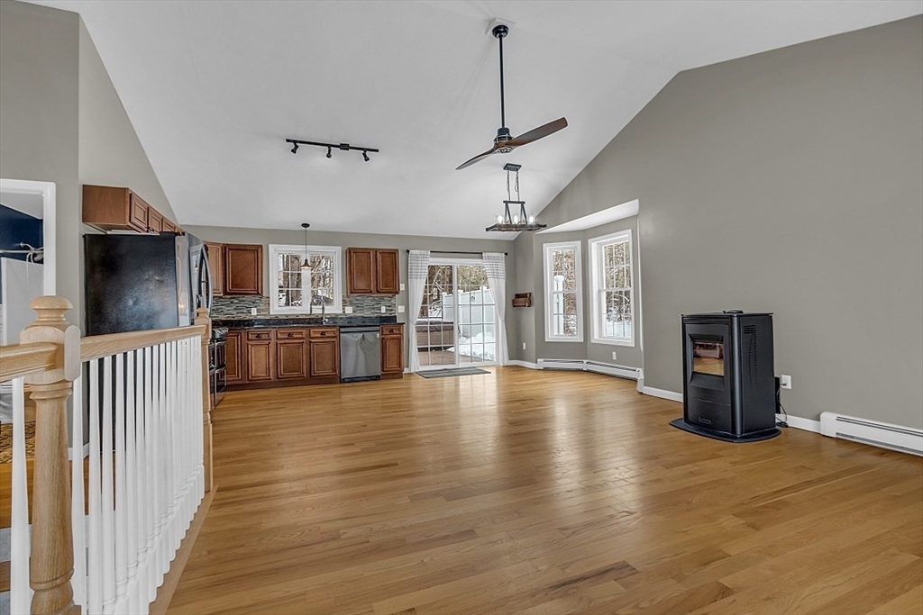 535 Clark Street Gardner, MA 01440 - Photo 11 of 41 a view of a livingroom with furniture wooden floor and windows