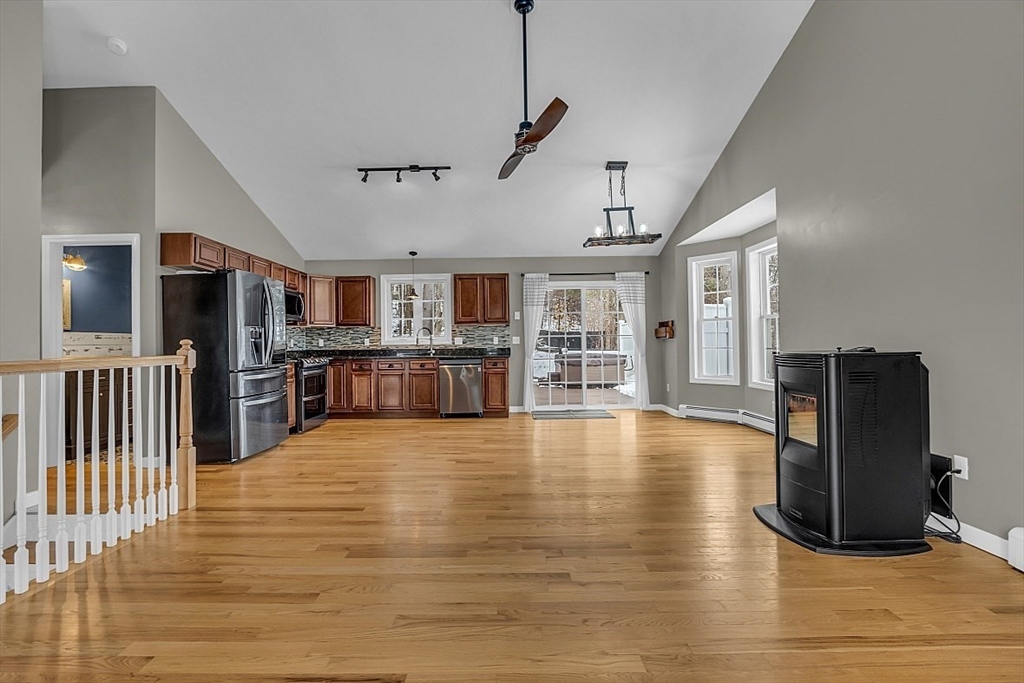 535 Clark Street Gardner, MA 01440 - Photo 12 of 41 a view of kitchen with furniture and wooden floor