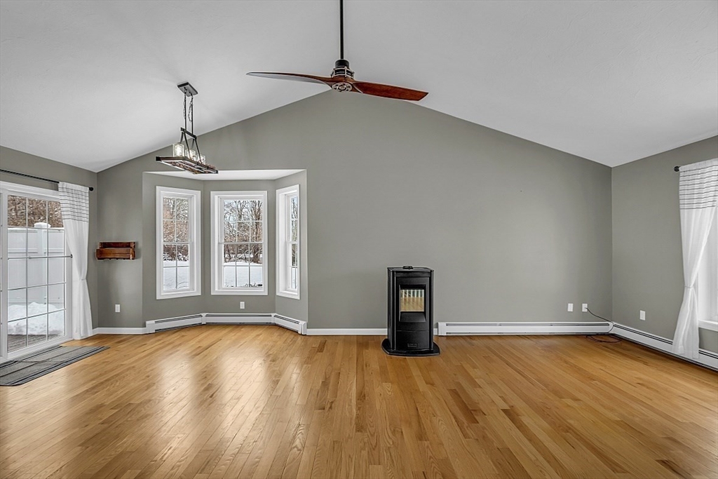 535 Clark Street Gardner, MA 01440 - Photo 14 of 41 a view of empty room with wooden floor and fan