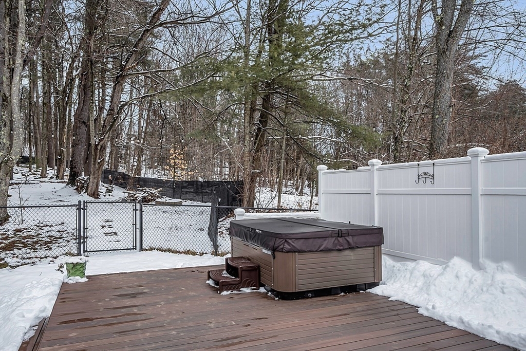 535 Clark Street Gardner, MA 01440 - Photo 34 of 41 a table and chair sitting in middle of the patio