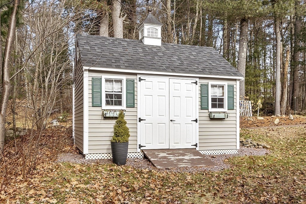 535 Clark Street Gardner, MA 01440 - Photo 35 of 41 a front view of a house with a yard