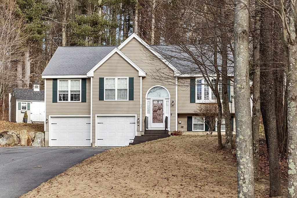 535 Clark Street Gardner, MA 01440 - Photo 36 of 41 front view of a house with a yard