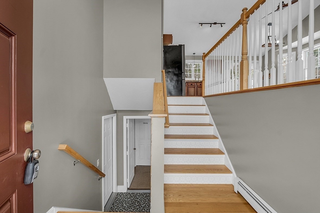 535 Clark Street Gardner, MA 01440 - Photo 4 of 41 a view of entryway and hall with wooden floor