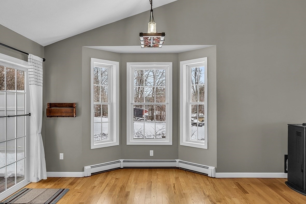 535 Clark Street Gardner, MA 01440 - Photo 6 of 41 a view of empty room with wooden floor and fan