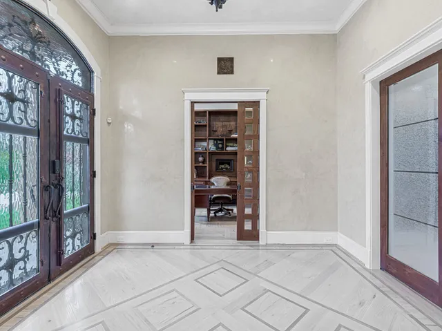 a hallway with a bench and a stove