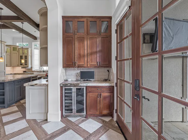a kitchen with a stove and a kitchen island