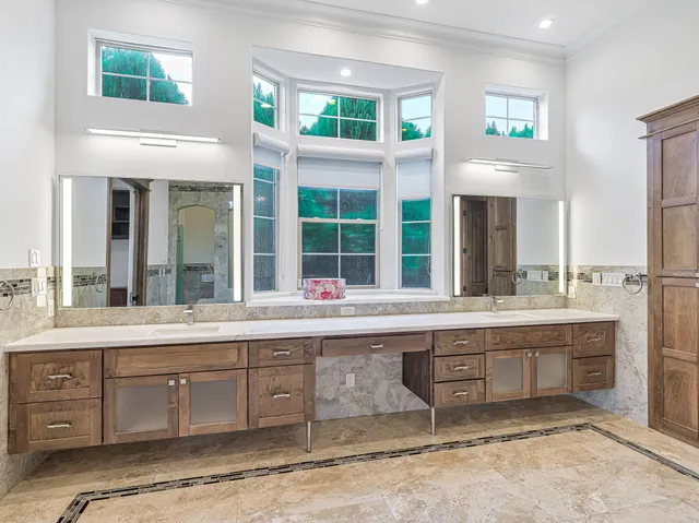 a view of a livingroom with furniture and a flat screen tv