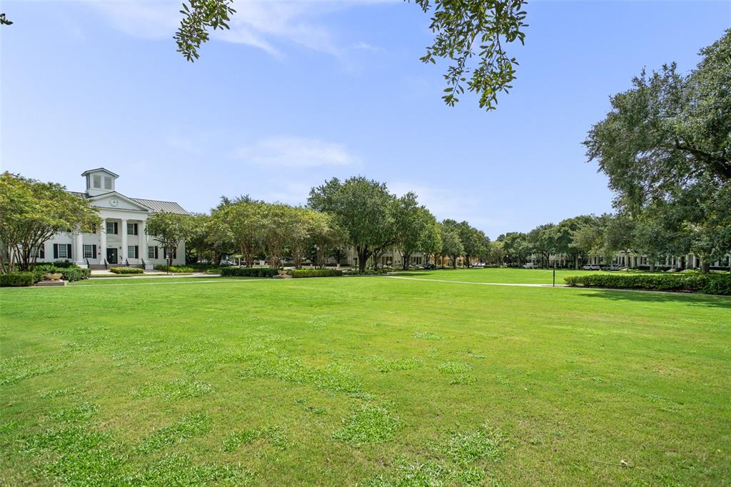 1563 Common Way Road Orlando, FL 32814 - Photo 42 of 47 a view of a green field with wooden fence