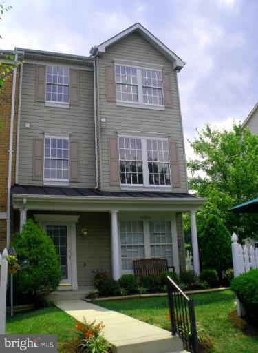4264 Maple Path Circle, Unit 4 Nottingham, MD 21236 - Photo 1 of 17 a front view of a house with garden