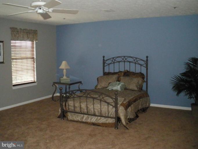 4264 Maple Path Circle, Unit 4 Nottingham, MD 21236 - Photo 13 of 17 a living room with furniture