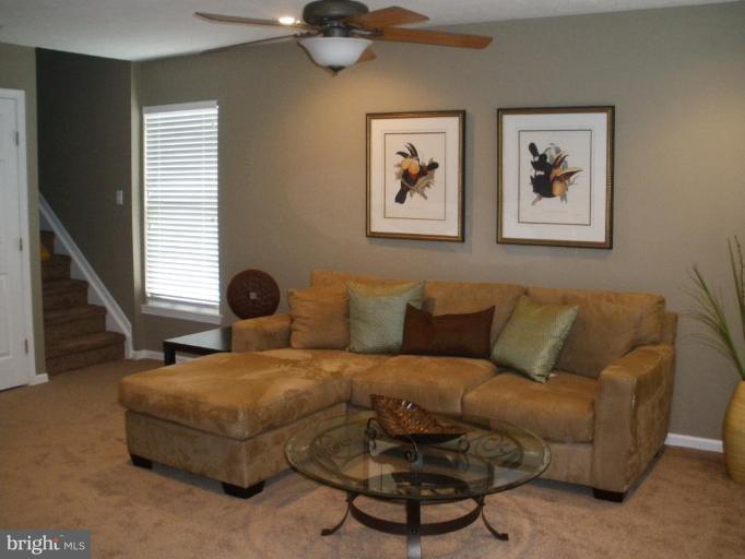 4264 Maple Path Circle, Unit 4 Nottingham, MD 21236 - Photo 4 of 17 a living room with furniture and a window