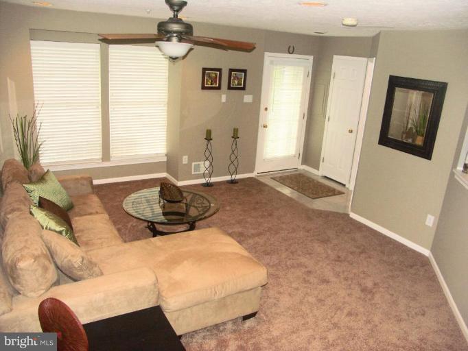4264 Maple Path Circle, Unit 4 Nottingham, MD 21236 - Photo 5 of 17 a bedroom with a bed and window