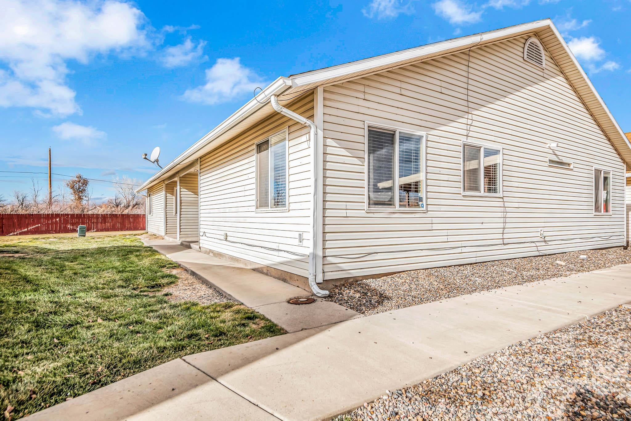 389 Sunnyside Circle, Unit A Grand Junction, CO 81504 - Photo 1 of 21 a view of a backyard of the house