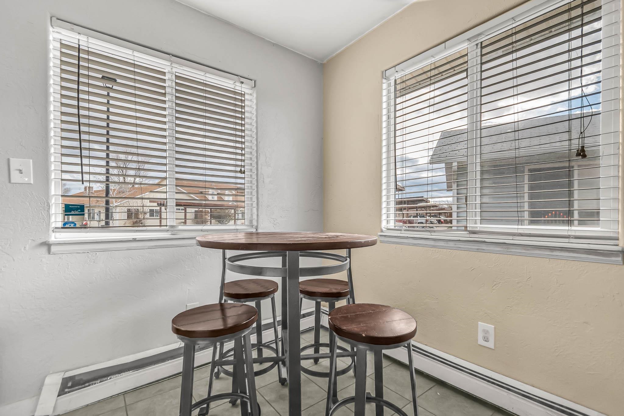389 Sunnyside Circle, Unit A Grand Junction, CO 81504 - Photo 13 of 21 a view of a room with a window and furniture