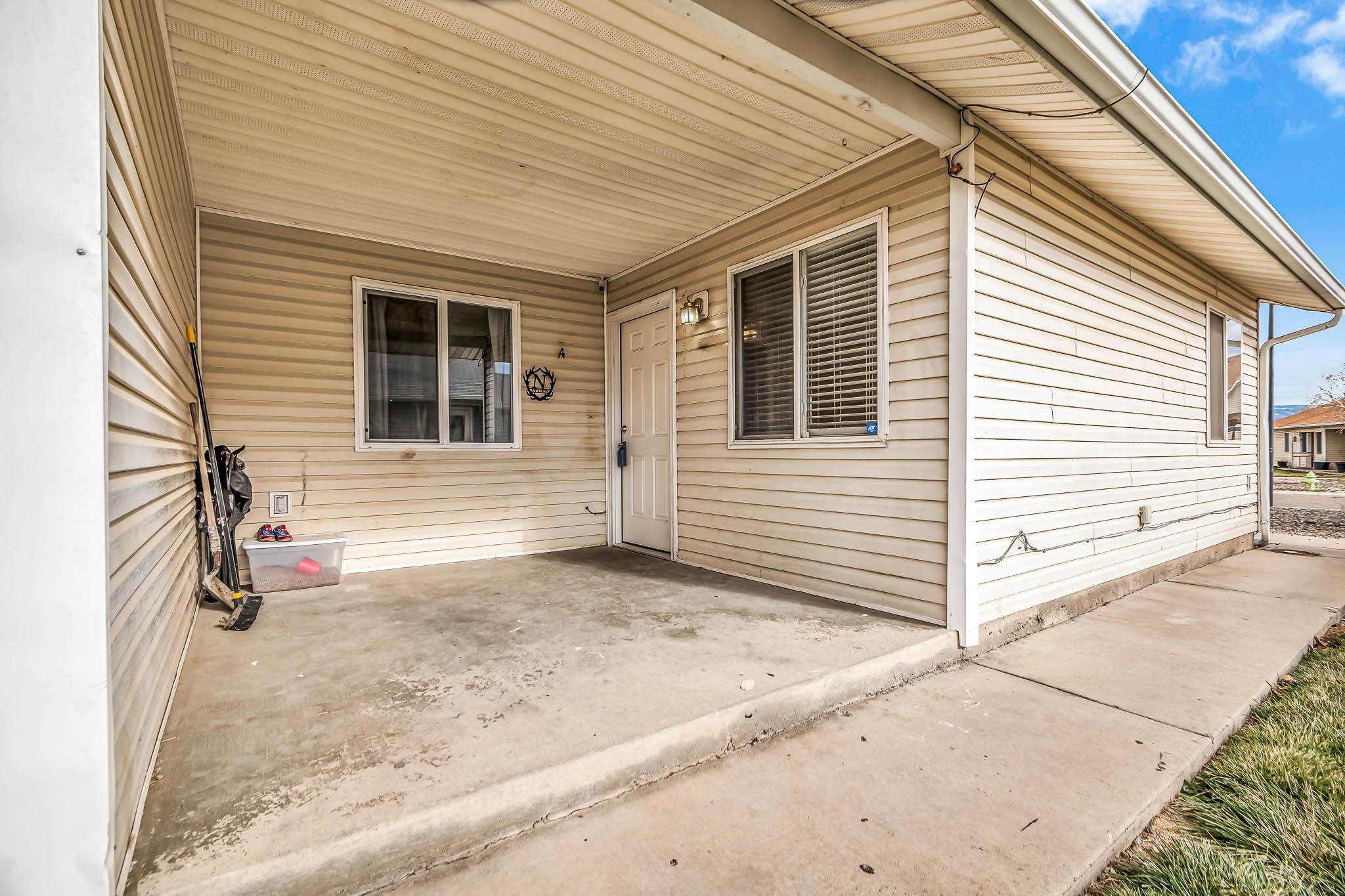 389 Sunnyside Circle, Unit A Grand Junction, CO 81504 - Photo 5 of 21 a view of house with a outdoor space