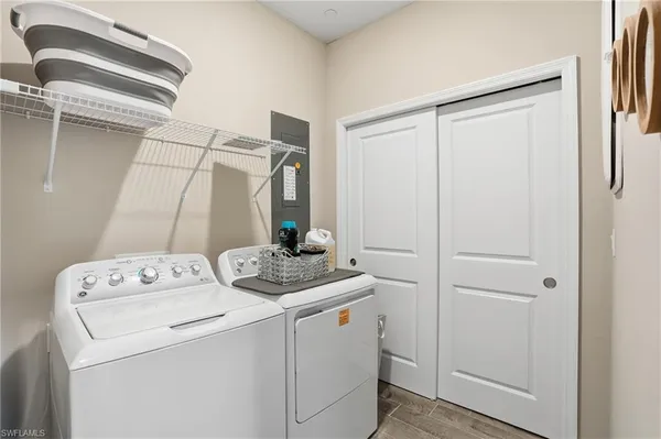 a utility room with dryer and washer