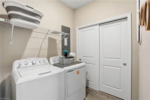 a utility room with dryer and washer