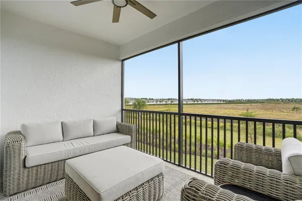 a balcony with furniture