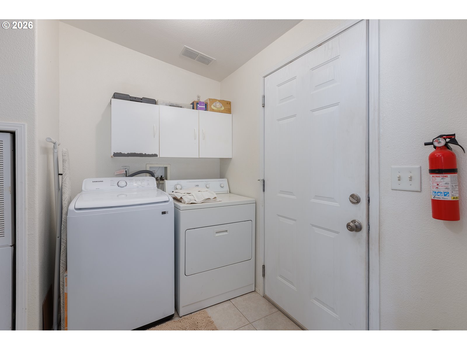 2018 Northwest Oceanic Loop Waldport, OR 97394 - Photo 27 of 35 a utility room with dryer and washer