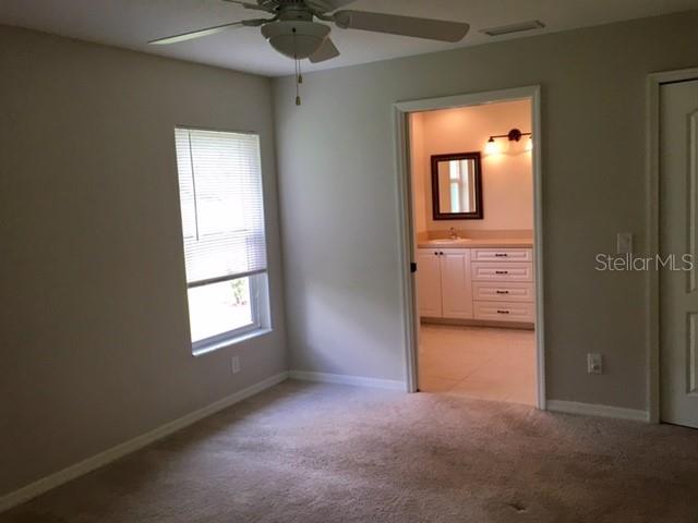 641 Constance Road Venice, FL 34293 - Photo 11 of 16 an empty room with a window and closet