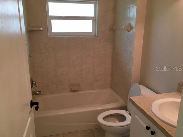 641 Constance Road Venice, FL 34293 - Photo 16 of 16 a bathroom with a sink a toilet and a bathtub