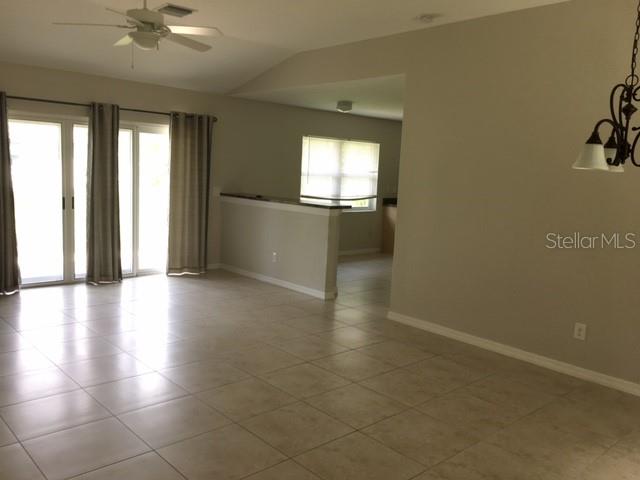 641 Constance Road Venice, FL 34293 - Photo 2 of 16 a view of empty room with windows