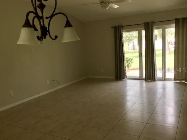 641 Constance Road Venice, FL 34293 - Photo 4 of 16 a view of a room with window and wooden floor