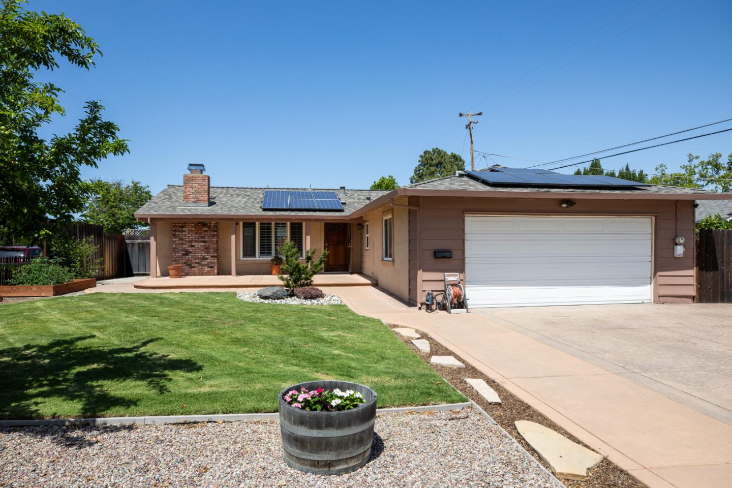 1937 Adelaide Way San Jose, CA 95124 - Photo 1 of 33 a front view of a house with a garden and porch