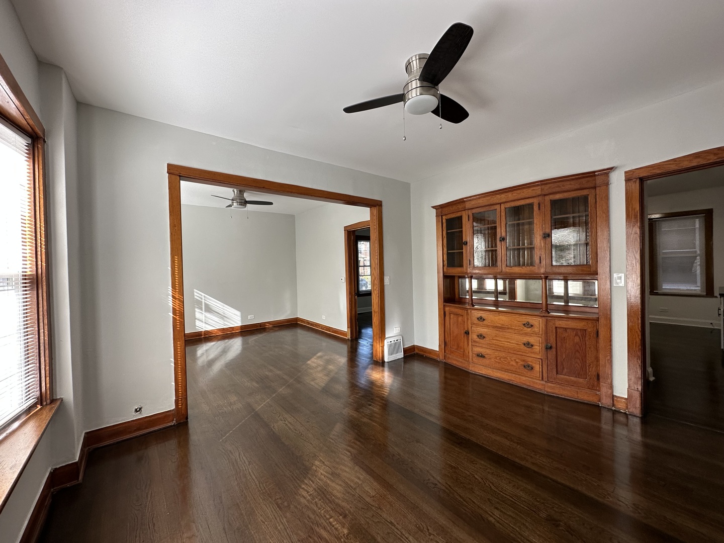 Undisclosed Address Chicago, IL 60618 - Photo 3 of 16 wooden floor in an empty room with a window