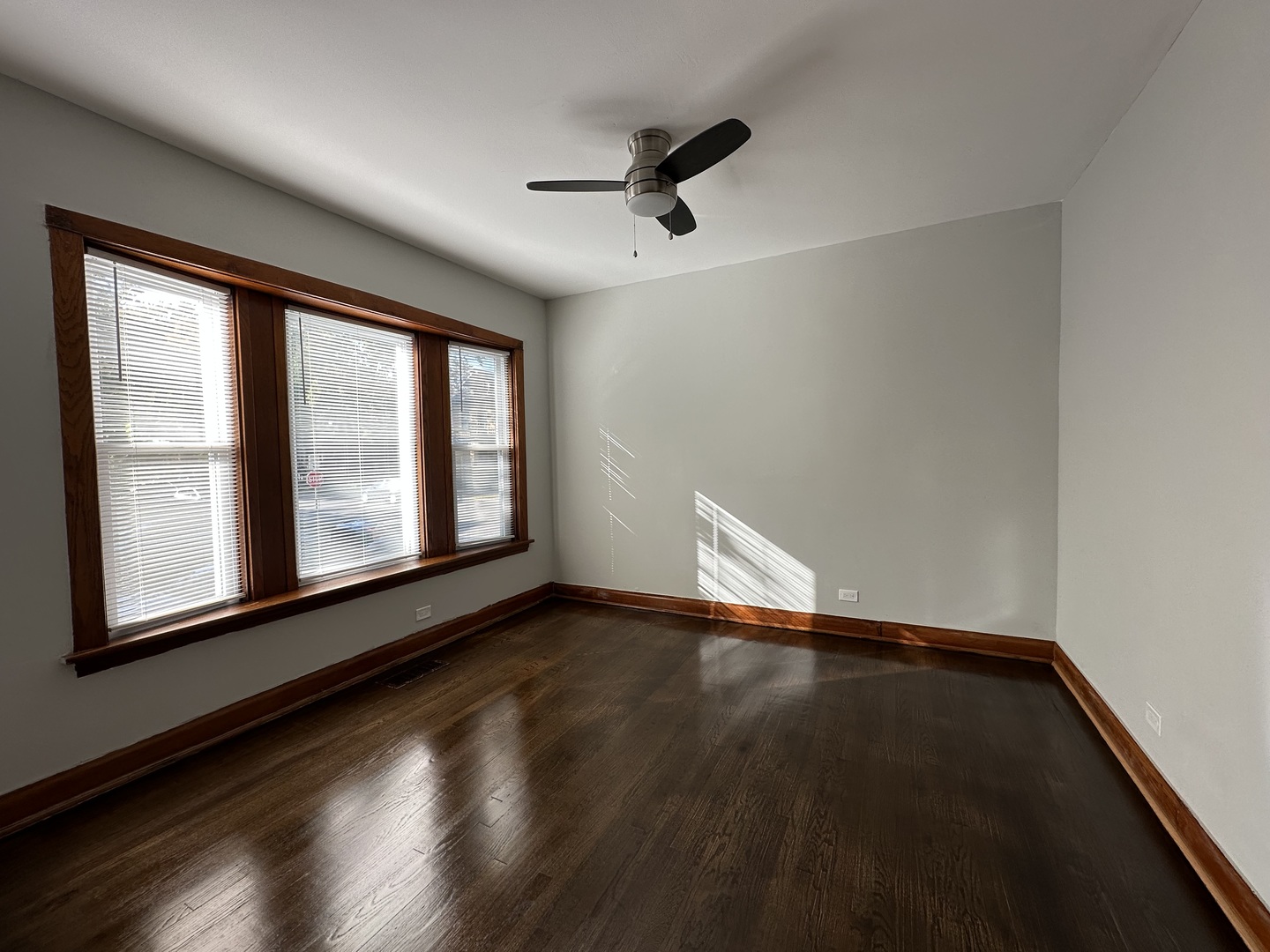 Undisclosed Address Chicago, IL 60618 - Photo 4 of 16 a view of an empty room with a window