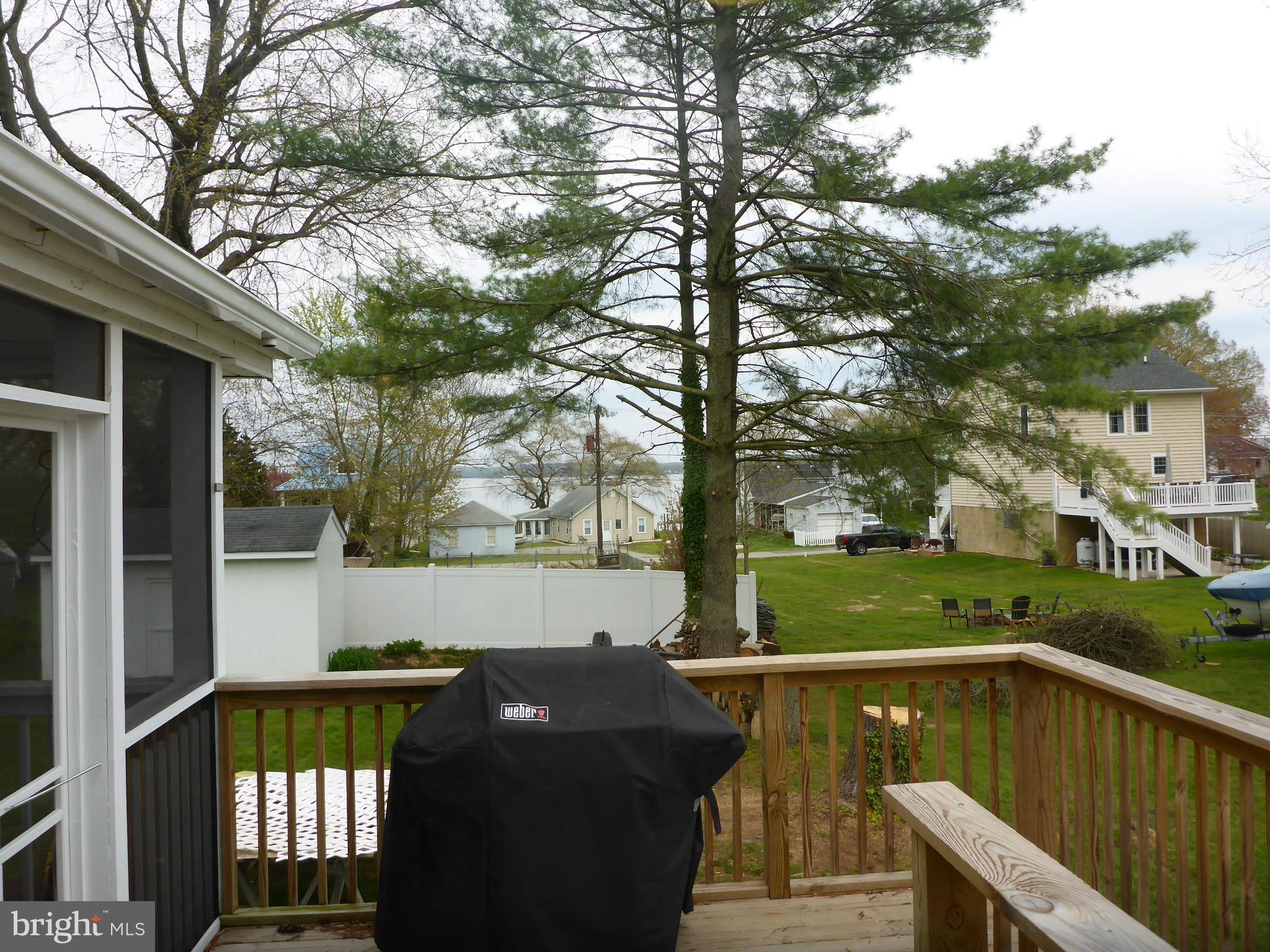 Look out at the water while BBQing.
