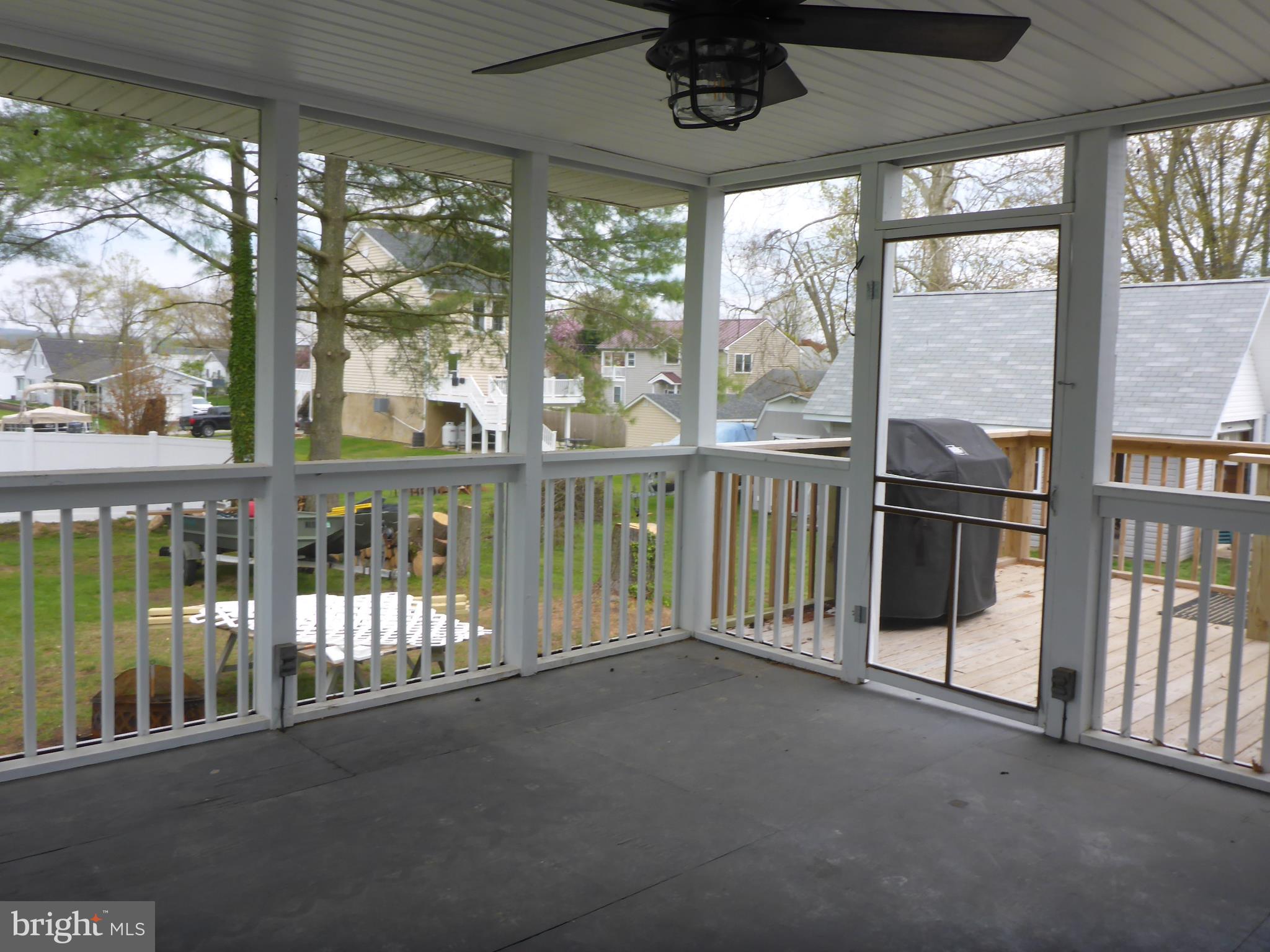 Screened porch flows to BBQ deck.