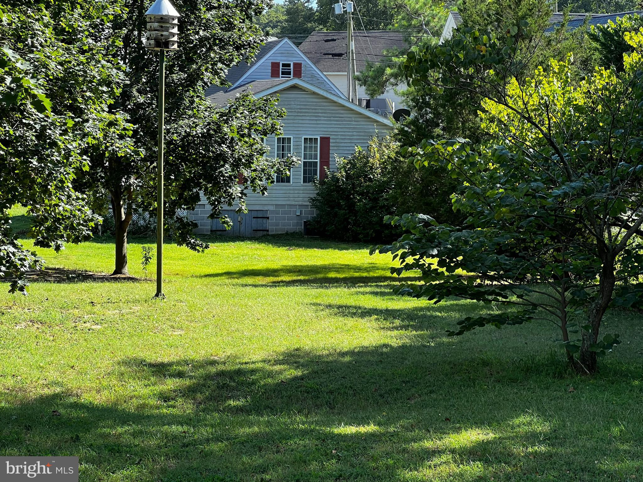 105 Boyce Mill Road Greensboro, MD 21639 - Photo 21 of 25 View of the back of the home and great yard.