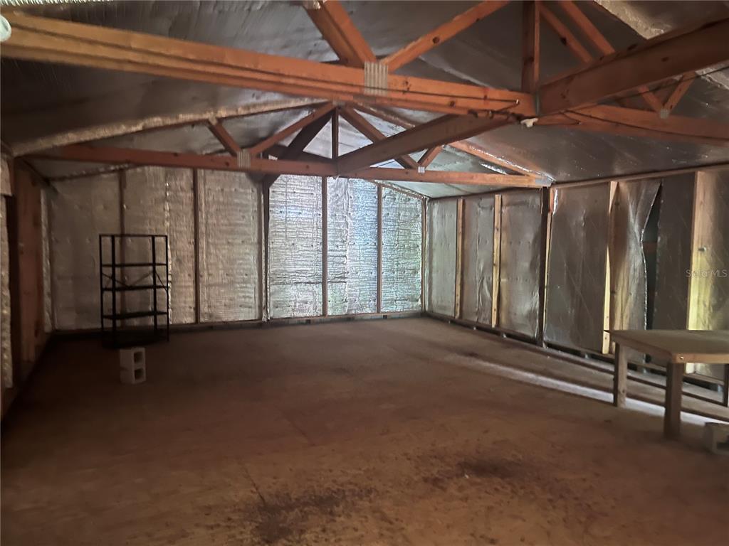 73 Alco Road Astor, FL 32102 - Photo 22 of 53 a view of a room with wooden walls