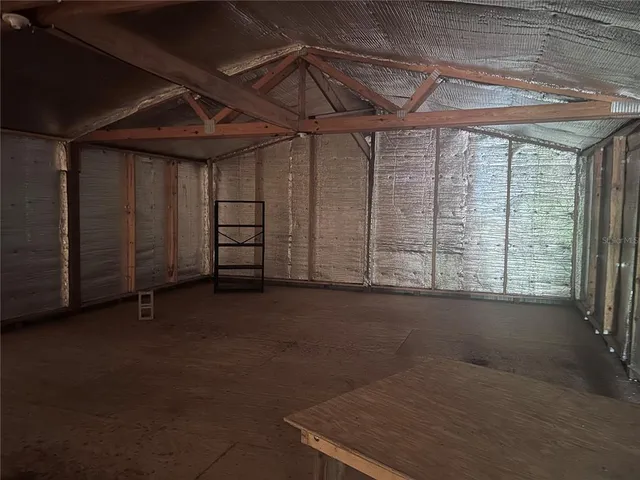 a view of a room with glass door