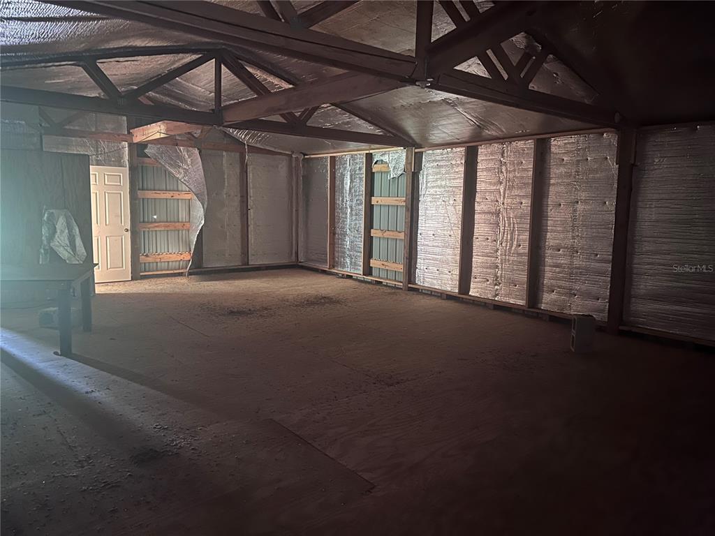 73 Alco Road Astor, FL 32102 - Photo 25 of 53 a view of empty room with windows