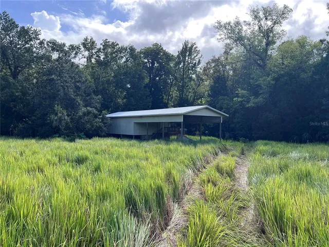 a view of an outdoor space and a yard