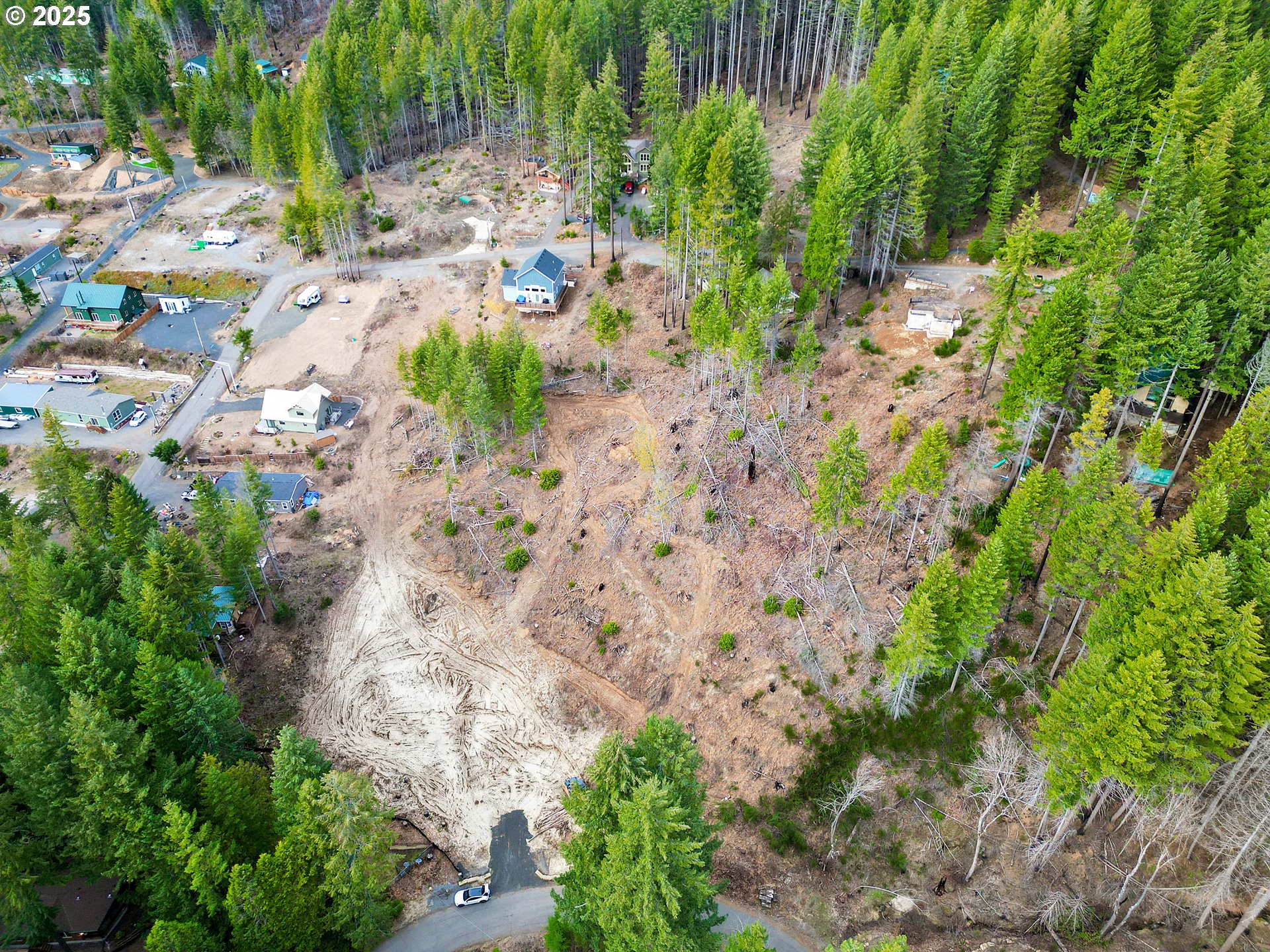 110 Guy Moore Road, Unit 1 Detroit, OR 97342 - Photo 8 of 11 a backyard of a house with lots of green space