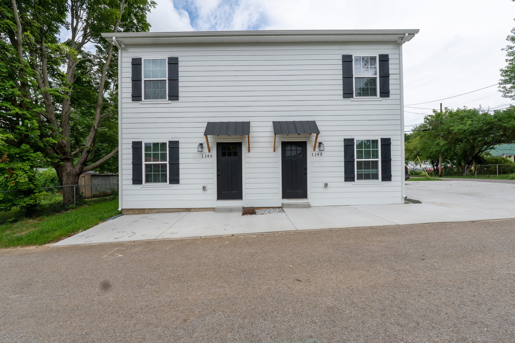 114 Wix Avenue, Unit B Portland, TN 37148 - Photo 12 of 13 a house with a outdoor space