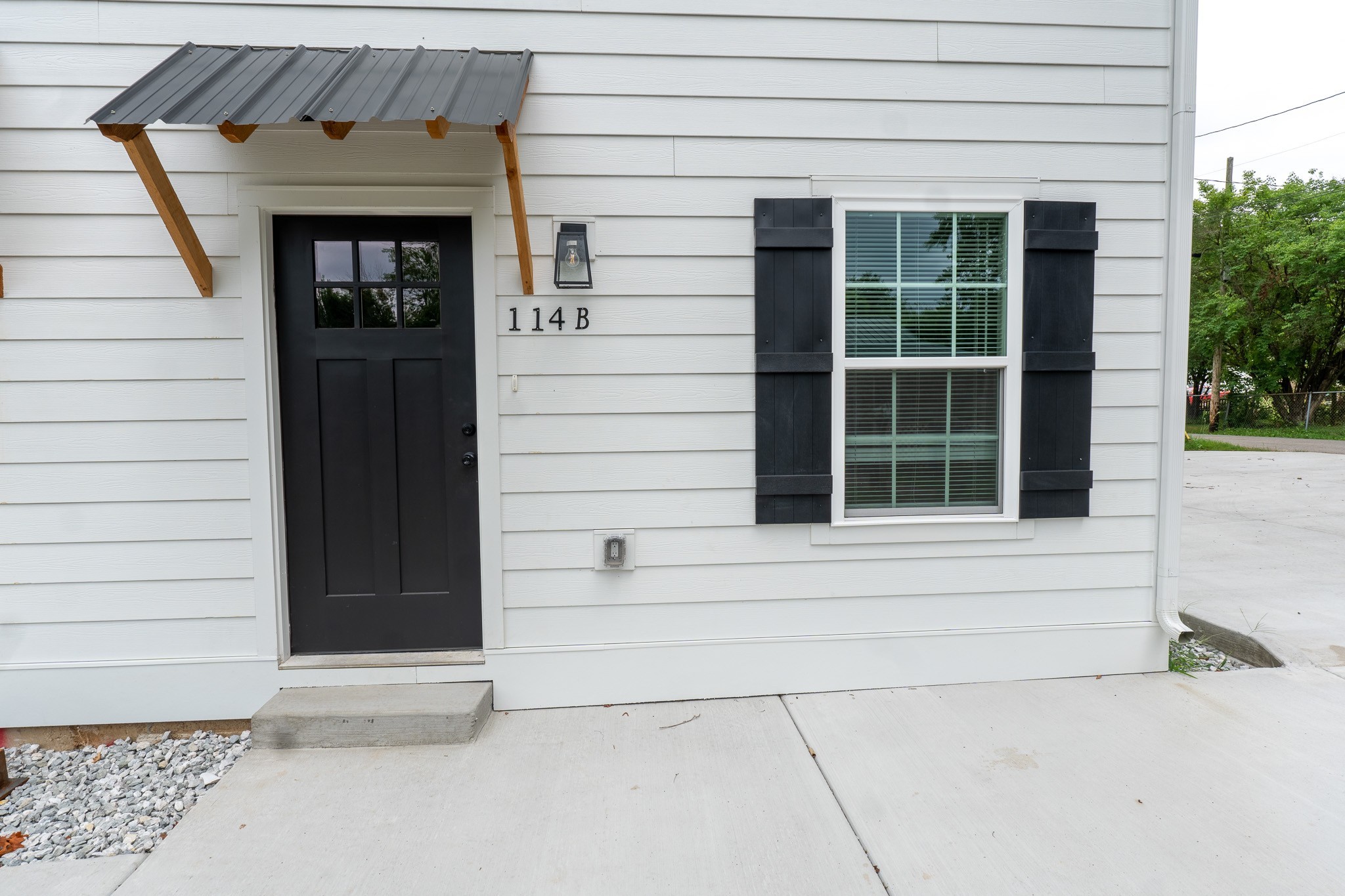 114 Wix Avenue, Unit B Portland, TN 37148 - Photo 13 of 13 a front view of a house with a window