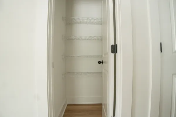 a bathroom with a glass shower door