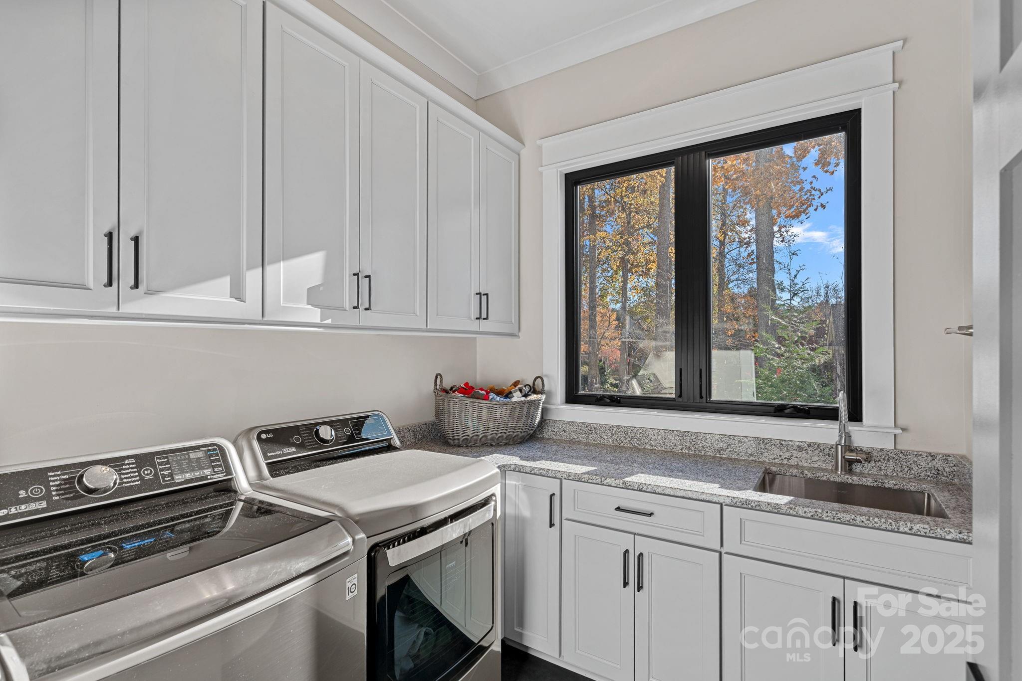 162 West Maranta Road Mooresville, NC 28117 - Photo 13 of 46 a kitchen with appliances cabinets and a sink