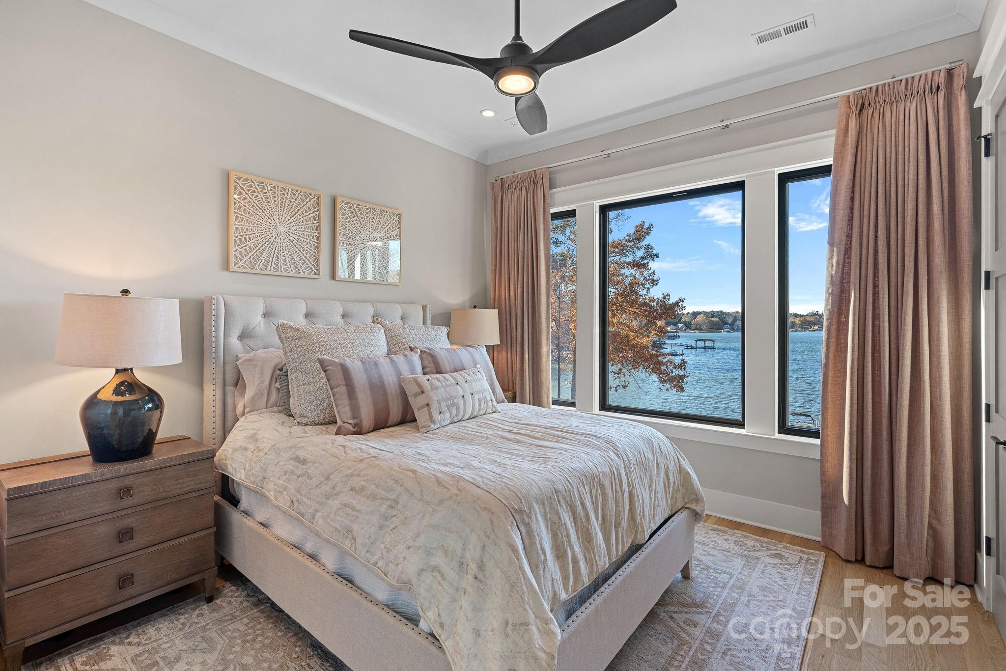 162 West Maranta Road Mooresville, NC 28117 - Photo 14 of 46 a bedroom with a large bed and a window