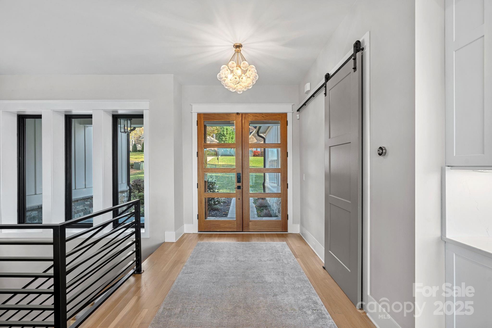 162 West Maranta Road Mooresville, NC 28117 - Photo 2 of 46 a view of an entryway with wooden floor